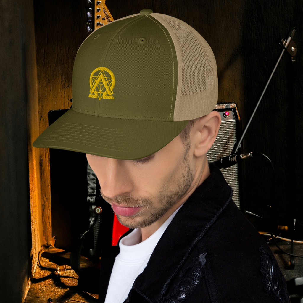 RNC Essential Artist's Trucker Cap olive front lifestyle view.