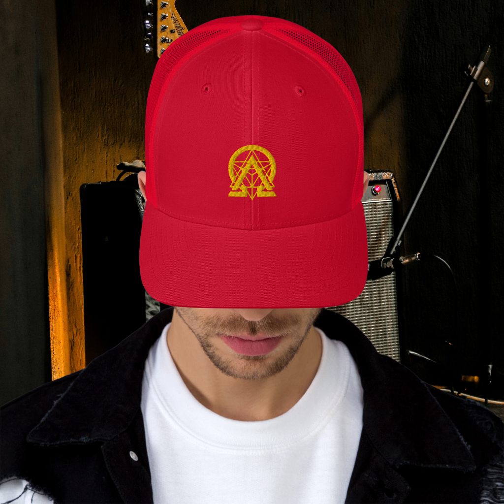 RNC Essential Artist's Trucker Cap red front lifestyle view.