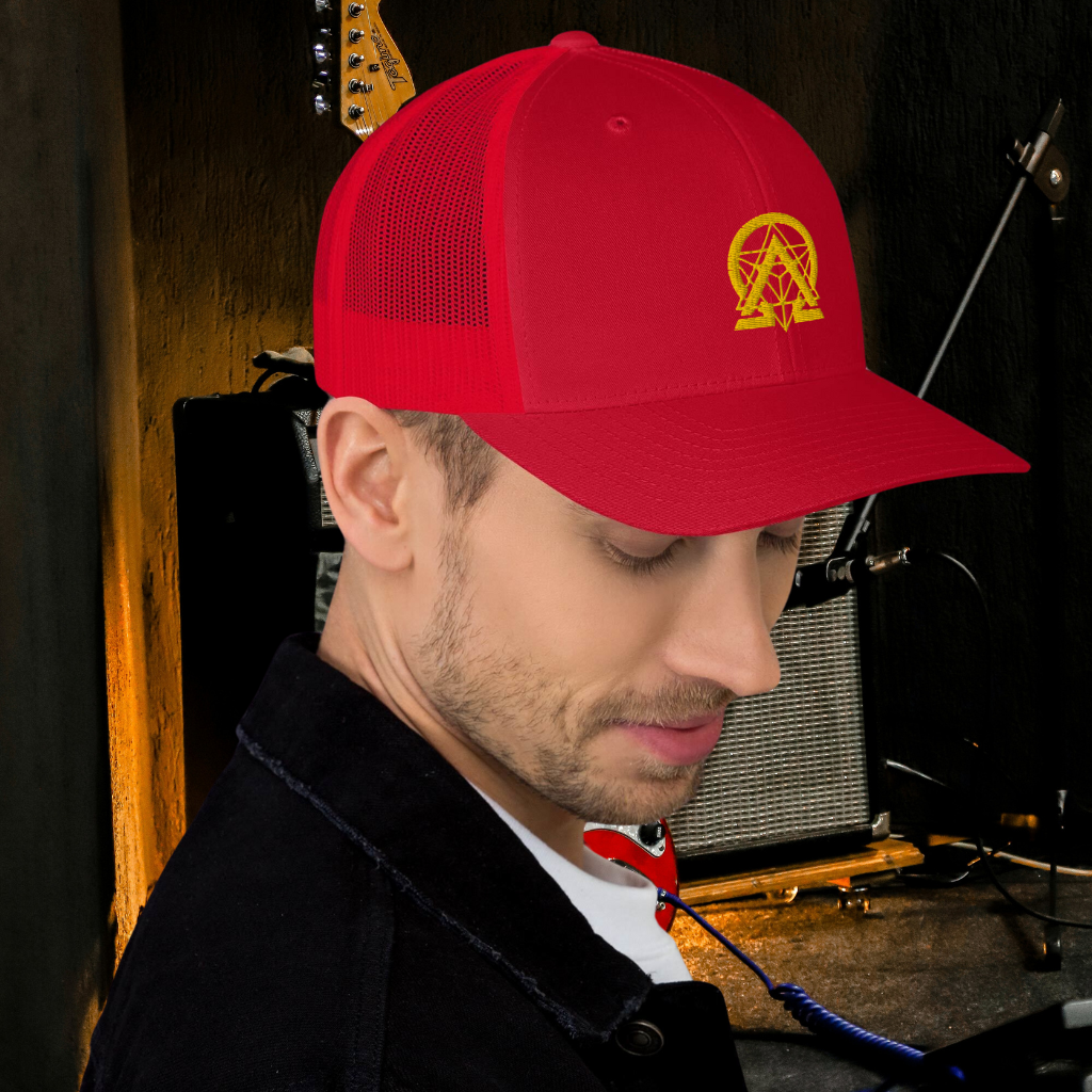 RNC Essential Artist's Trucker Cap red angled lifestyle view.